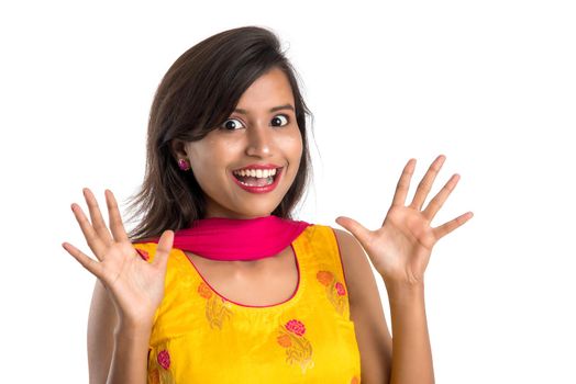 Beautiful Indian traditional girl posing on white background.