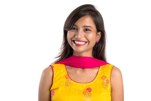 Portrait of beautiful young smiling girl on a white background.