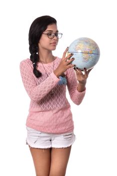 Beautiful Girl holding a world globe isolated on a white background