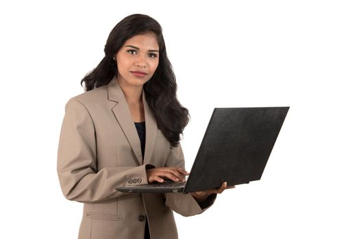 Young happy smiling woman holding laptop.