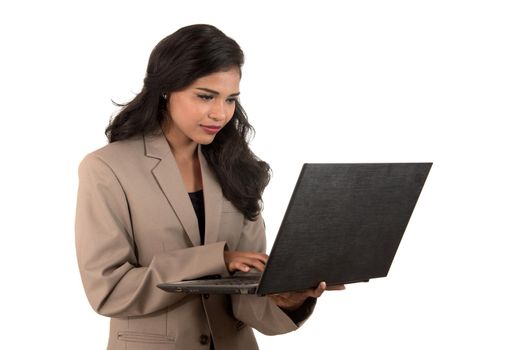 Young happy smiling woman holding laptop.