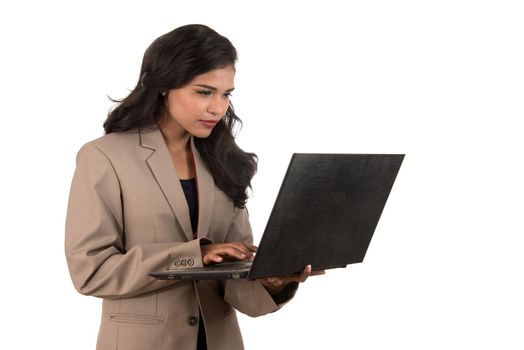 Young happy smiling woman holding laptop.