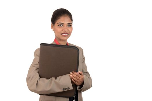 Young happy business woman holding folder