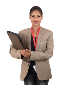 Young happy business woman holding folder