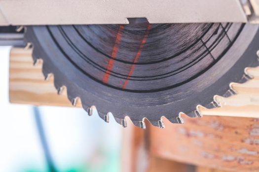 Close up of circular metal saw blade on construction site