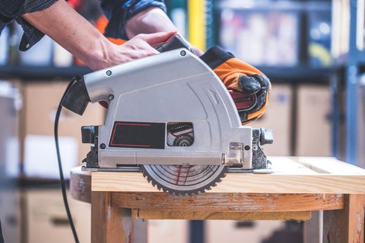 Close up of circular saw, ready for sawing wood planks