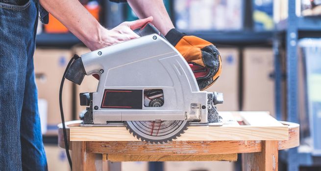 Close up of circular saw, ready for sawing wood planks