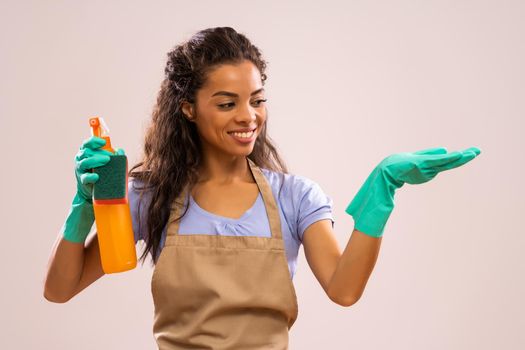 Portrait of african-american housewife who is ready for housework.