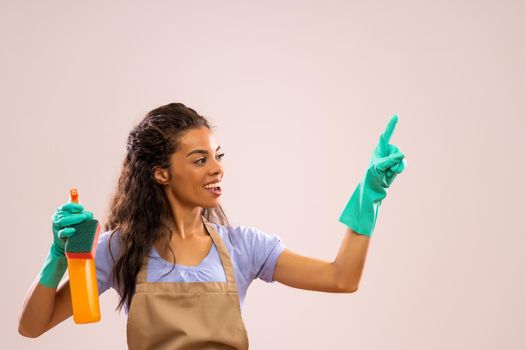 Portrait of african-american housewife who is ready for housework.