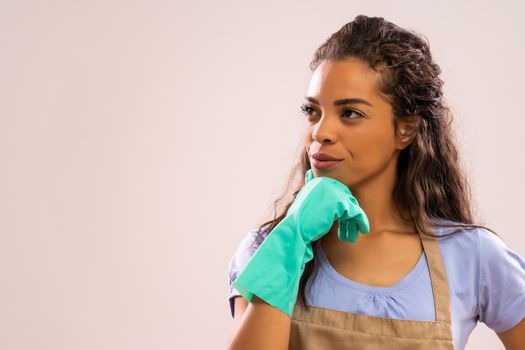 Portrait of african-american housewife who is ready for housework.