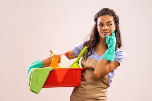 Portrait of african-american housewife who is ready for housework.