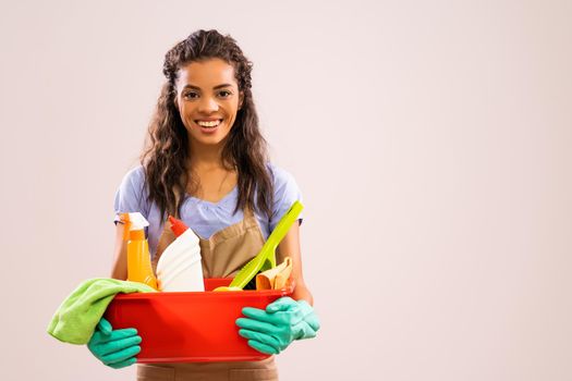 Portrait of african-american housewife who is ready for housework.