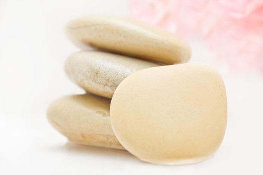 pile of hot massage stones - beauty, spa and body care styled concept, elegant visuals