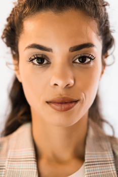 Portrait of beautiful african american woman looking at camera.