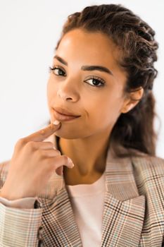 Portrait of beautiful african american woman who is worried and pensive.