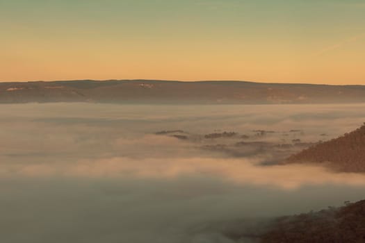 Fog in the Megalong Valley in The Blue Mountains in New South Wales in Australia