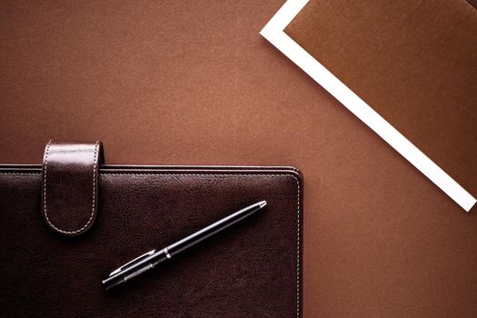 Productivity, work and corporate lifestyle concept - Vintage business briefcase on the office table desk, flatlay background