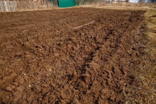 Plowed ground before spring potato planting.