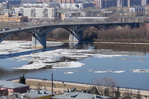 Panorama on a beautiful big bridge over a river in the city. High quality photo