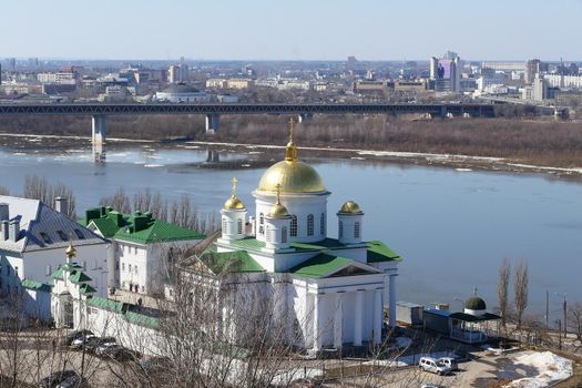 Panoramic views of the port city with churches, a river and a bridge over the river. High quality photo