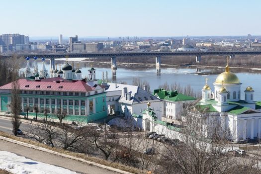 Panoramic views of the port city with churches, a river and a bridge over the river. High quality photo