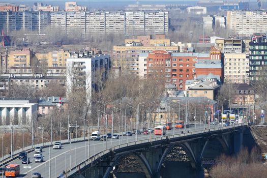 Panoramic view of the transport bridge over the river in the big city. High quality photo