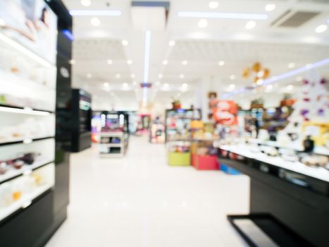 Abstract blurred interior of beauty store as background. Cosmetic shop blur