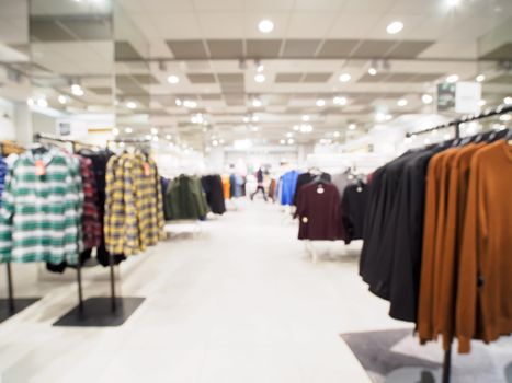 Blur image of clothes in clothing store as background