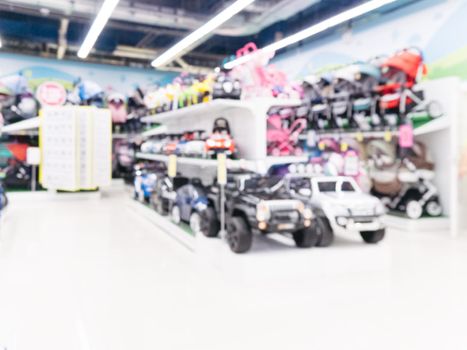 Blurred of kids toy store background with bokhe