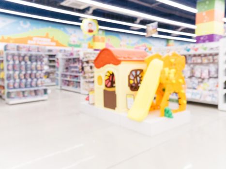 Blurred of kids toy store background with bokhe