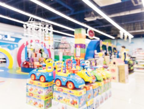 Blurred of kids toy store background with bokhe