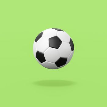 Classic Black and White Soccer Ball Isolated on Flat Green Background with Shadow 3D Illustration
