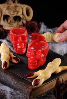 Dip crispy shortbread cookies in the form of witch fingers in hot chocolate "Red Velvet".This is just delicious.