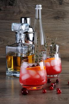 Cocktail Cranberry Orange Bourbon Smash with a spicy hint of thyme