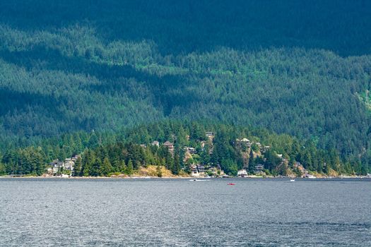 Beautiful view over ocean harbor with boats on the water and residential houses on the mountain in Vancouver, Canada. - Image