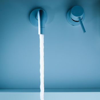 faucet with flowing water in a hospital