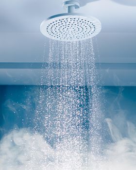 contrast shower with flowing water stream and steam