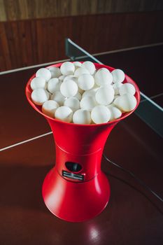 table tennis balls in the robot trainer