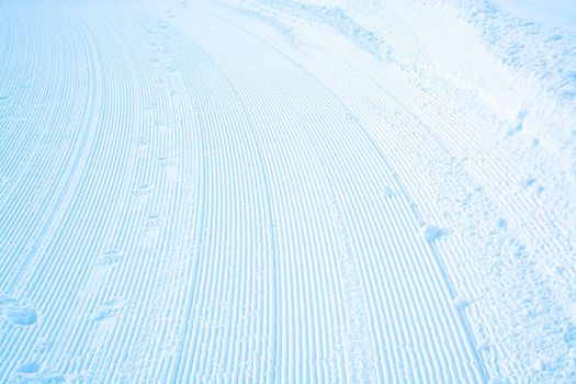 Stripes on snow surface profiled for future ski trace
