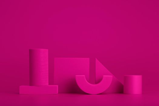 Purple geometric figures against purple background. Concept of geometric minimalistic horizontal still life