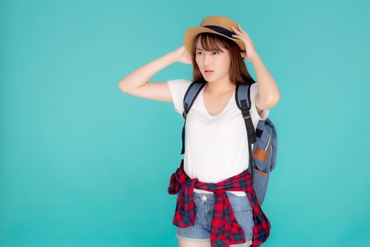 Beautiful young asian woman upset and worry travel summer trip in abroad isolated on blue background, tourist asia girl having problem and stress journey in vacation for leisure, holiday concept.