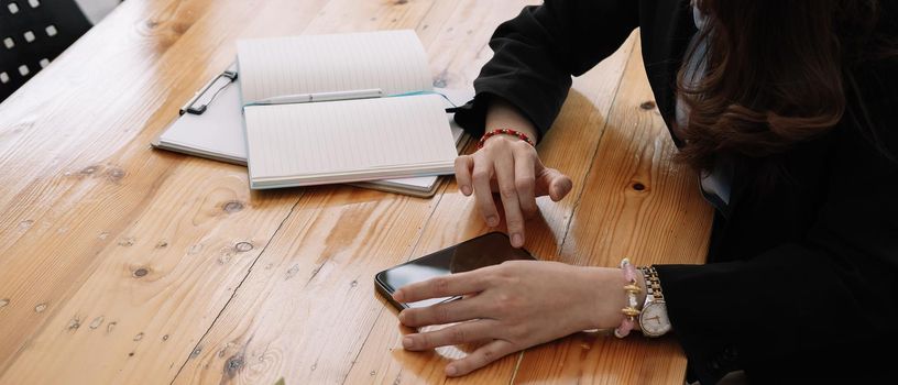 business, technology concept - Portrait of woman hands texting message on smartphone at office