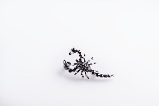Bijouterie and jewelry on a white background. Brooches and hairpins, earrings and pendants. Isolate. Copy space