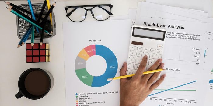 Fund managers researching and analysis Investment stock market by paperwork