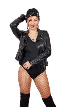 young woman in leather jacket, hat, mesh tights and boots posing standing in studio. closeup on white background