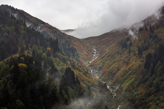 Ayder Plateau Natural Gelintulu Waterfall surrounded by autumn colors near Rize, Turkey.