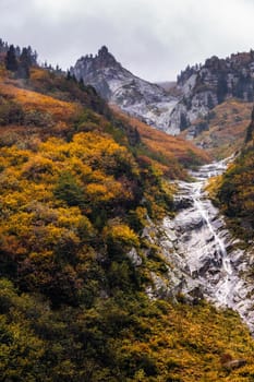 Ayder Plateau Natural Gelintulu Waterfall surrounded by autumn colors near Rize, Turkey.