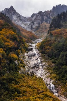 Ayder Plateau Natural Gelintulu Waterfall surrounded by autumn colors near Rize, Turkey.