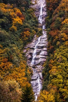 Ayder Plateau Natural Gelintulu Waterfall surrounded by autumn colors near Rize, Turkey.