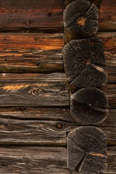 Wooden log cabin or felling  Rustic texture or background. Aged wood wall and boards